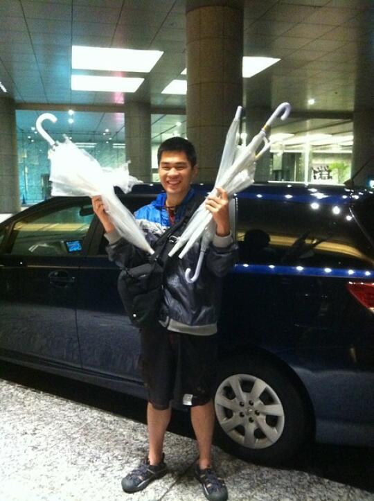 Son with all the Fujis' broken umbrellas