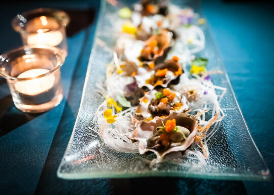 Course 2: Canal Oysters with tobiko, basil chiffonade, Sriracha, and ponzu sauce