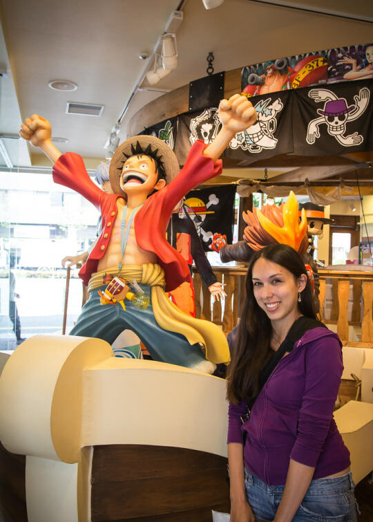 Allison standing with a Luffy statue