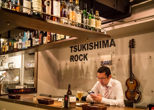 Businessman at the bar in Tsukishima Rock