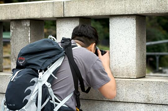 Son taking pictures