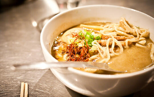 Green curry ramen with a bite or two taken out