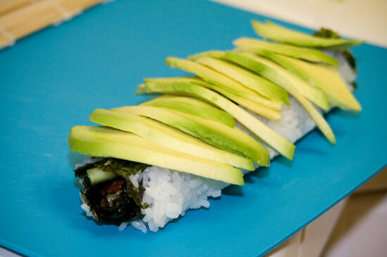 Toppings on an uramaki roll