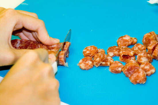 Slicing the Chinese sausages