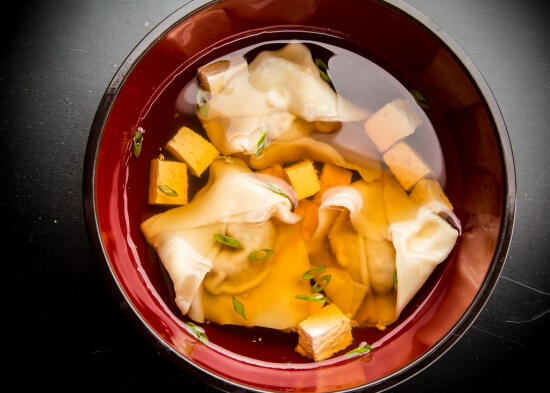 Clear soup with pumpkin dumplings