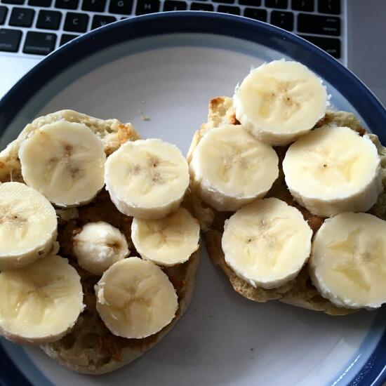 English muffin with peanut butter and bananas