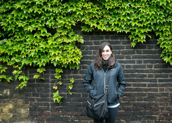 Allison in front of a wall