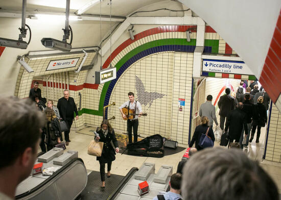 Musician playing in Picadilly Circle Station