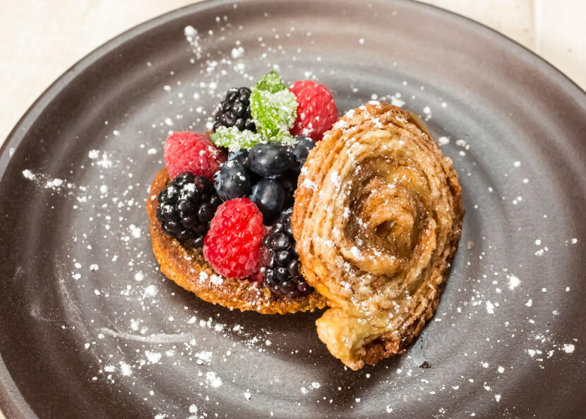 bran muffin top with fruit, topped with an arlette