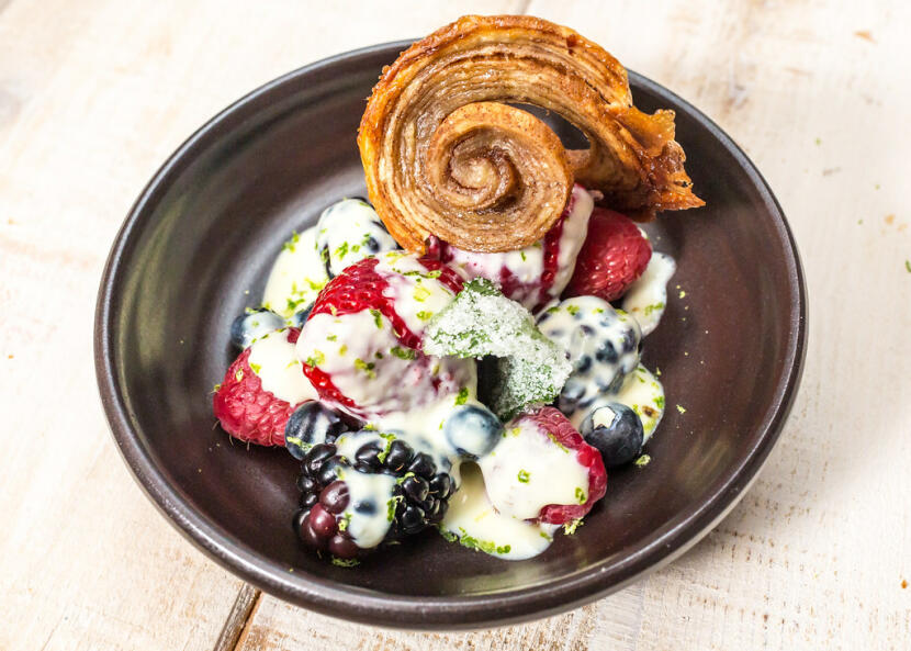 berry salad with candied mint and a puff pastry arlette