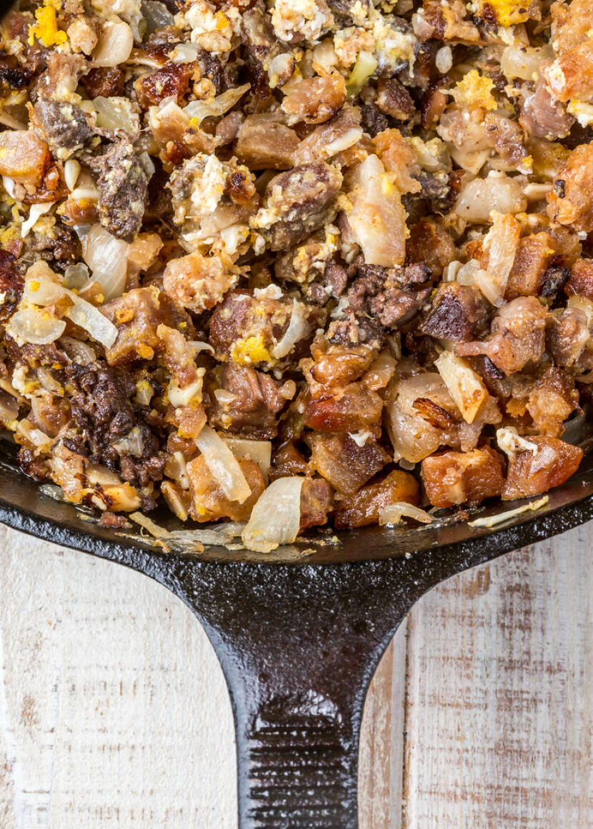 Sisig in a cast-iron pan