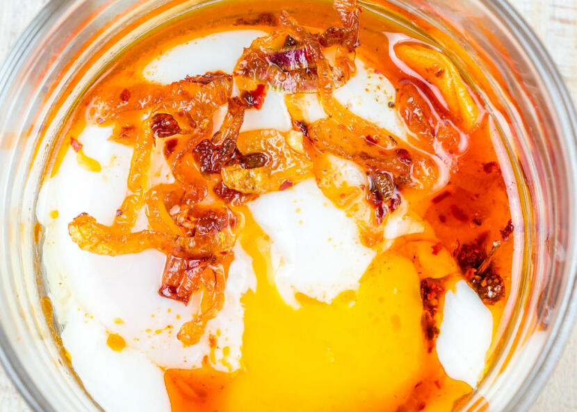 chili crisp over a soft-boiled egg