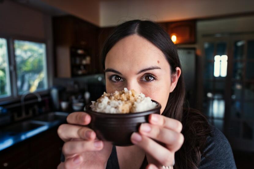 Allison holding a bowl of teriyaki sauce